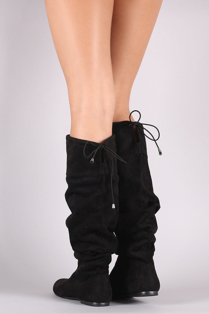 corie slouchy flat boot